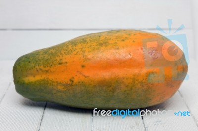 Fresh Tropical Papaya Fruit Isolated On A White Background Stock Photo