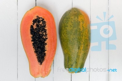 Fresh Tropical Papaya Fruit Isolated On A White Background Stock Photo