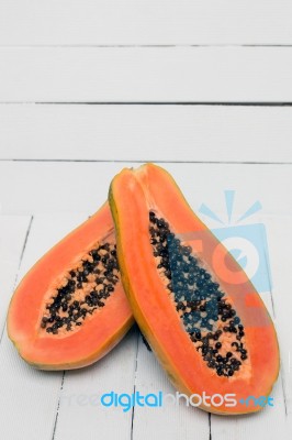 Fresh Tropical Papaya Fruit Isolated On A White Background Stock Photo