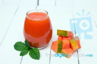 Fresh Tropical Papaya Juice Isolated On A White Background Stock Photo