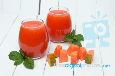 Fresh Tropical Papaya Juice Isolated On A White Background Stock Photo