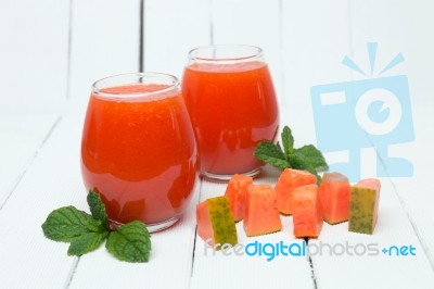 Fresh Tropical Papaya Juice Isolated On A White Background Stock Photo