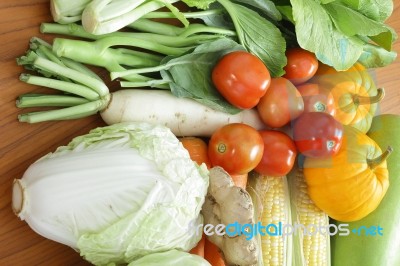 Fresh Vegetables Arrange On The Wood Table Stock Photo