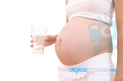 Fresh Water Drinking Of Pregnant Woman On White Background Stock Photo