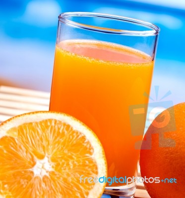 Freshly Squeezed Orange Means Tropical Fruit And Oranges Stock Photo