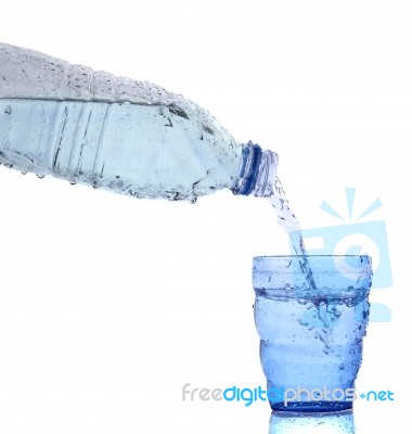 Freshness Cool And Clean Drinking Water Pouring To Blue Glass Is… Stock Photo