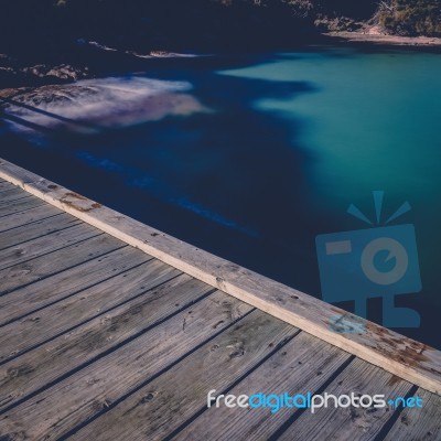 Freycinet Pier By Coles Bay In Tasmania Stock Photo