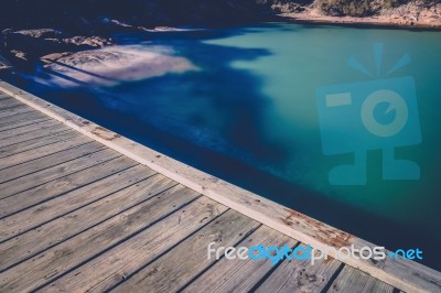 Freycinet Pier By Coles Bay In Tasmania Stock Photo