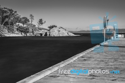 Freycinet Pier By Coles Bay In Tasmania Stock Photo