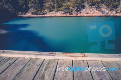 Freycinet Pier By Coles Bay In Tasmania Stock Photo