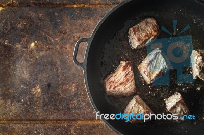 Fried Angus Beef In The Hot Pan Top View Stock Photo