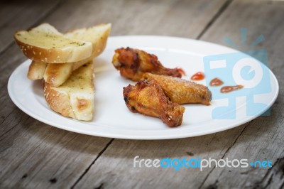 Fried Chicken And Garlic Bread Stock Photo