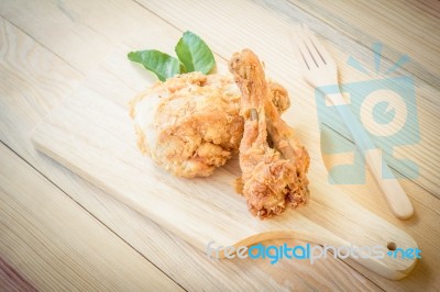 Fried Chicken In Batter  On A Wooden Background Stock Photo