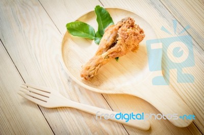 Fried Chicken In Batter  On A Wooden Background Stock Photo