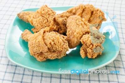 Fried Chicken On Green Dish Stock Photo