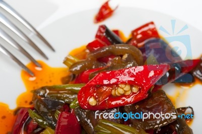 Fried Chili Pepper And Vegetable On A Wok Pan Stock Photo