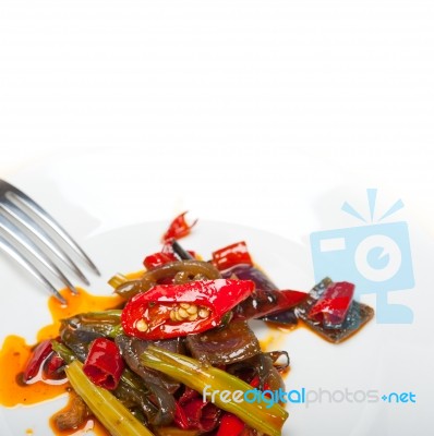 Fried Chili Pepper And Vegetable On A Wok Pan Stock Photo