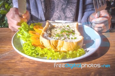 Fried Eggs And Bread Stock Photo