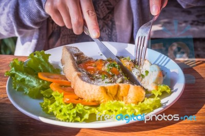 Fried Eggs And Bread Stock Photo