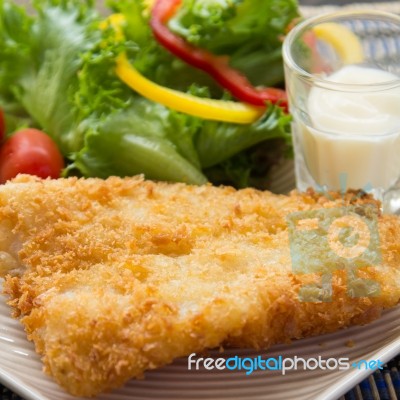 Fried Fish And Salad Stock Photo