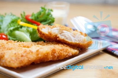 Fried Fish And Salad Stock Photo