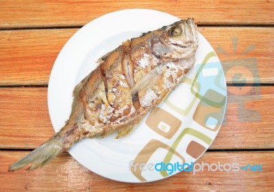 Fried Fish On Dish Stock Photo