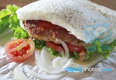 Fried Meat Sandwich Bread With Green Vegetable Tomato And Onion Stock Photo