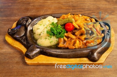 Fried Mushrooms With Potatoes Stock Photo