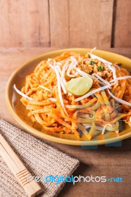 Fried Rice Noodles Topped With Pork Stock Photo