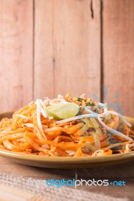 Fried Rice Noodles Topped With Pork Stock Photo