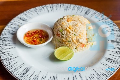 Fried Rice With Fish Sauce Chilli And Lemon. Thai Cuisine Stock Photo