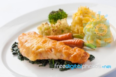 Fried Salmon With Spinach Stock Photo