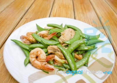 Fried Shrimp, Pork And Sweet Peas Stock Photo