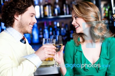 Friends Enhoying Drinks In Nightclub Stock Photo