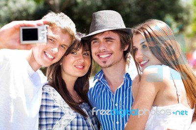 Friends Taking Self Portrait, Outdoors Stock Photo