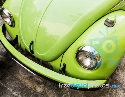 Front Side Of Green Old Car Stock Photo