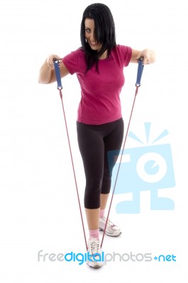 Front View Of Exercising Woman Stock Photo