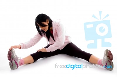 Front View Of Exercising Woman On White Background Stock Photo