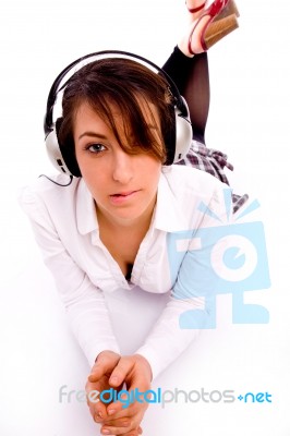 Front View Of Fashionable Female Enjoying Music Stock Photo