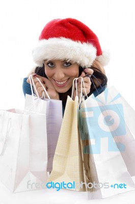 Front View Of Happy Christmas Woman With Shopping Bags Stock Photo