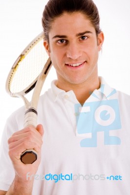 Front View Of Male Carrying Racket Stock Photo