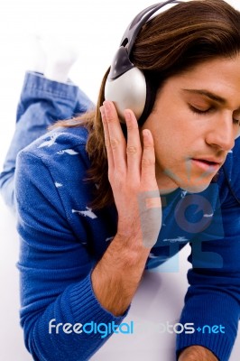 Front View Of Man Tuned In Music Stock Photo