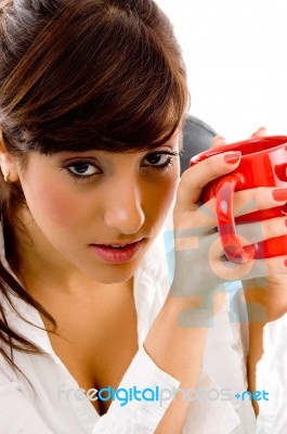 Front View Of Woman Holding Mug Stock Photo