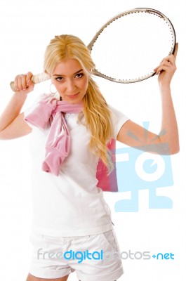 Front View Of Young Tennis Player Holding Racket Stock Photo