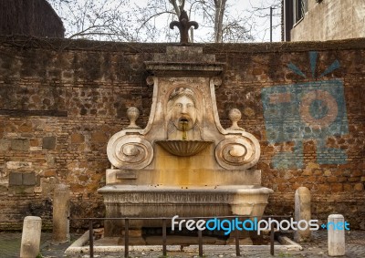 Frontal View Of The Ancient Fountain Of The Mask (fontana Del Ma… Stock Photo