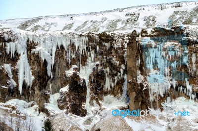 Frozen Waterfall Near Vik Iceland Stock Photo