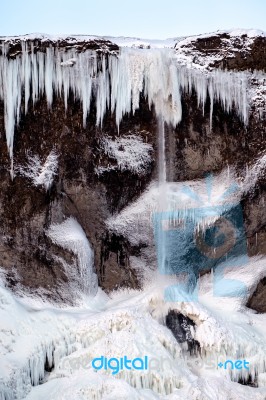 Frozen Waterfall Near Vik Iceland Stock Photo