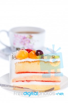 Fruit Cake With A Cup Of Coffee Stock Photo