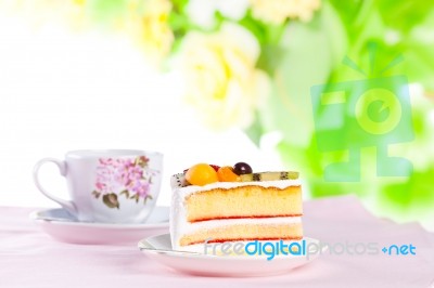 Fruit Cake With A Cup Of Coffee Stock Photo