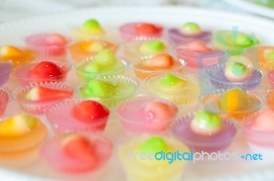 Fruit Shaped Mung Beans In Jelly Close Up In White Foam Dish, Wun Look Choup Thai Sweets Stock Photo